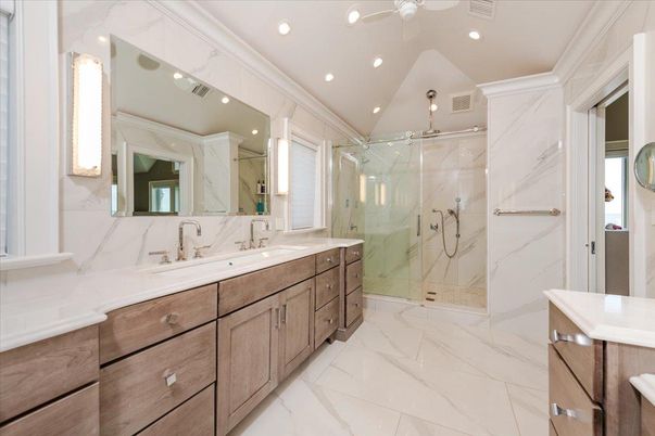 Bathroom, Dual Sink Vanities, Glass Shower, Interior, Marble, Marble Walls, Recessed Lighting