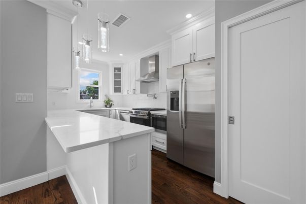 Interior, Kitchen, Pendant Lights, Recessed Lighting, Stainless Steel Appliances, Wood Texture Flooring