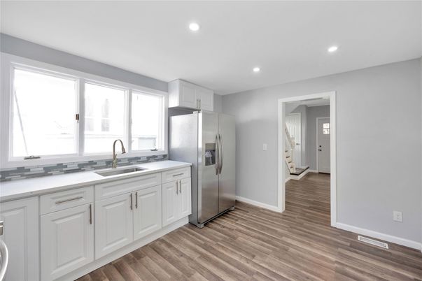 Interior, Kitchen, Recessed Lighting, Stainless Steel Appliances, Wood Texture Flooring