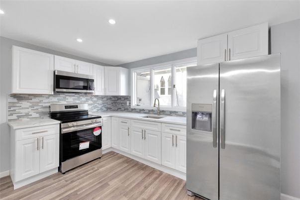 Interior, Kitchen, Recessed Lighting, Stainless Steel Appliances, Wood Texture Flooring