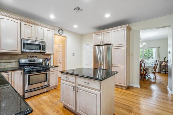 Dining room, Interior, Kitchen, Recessed Lighting, Stainless Steel Appliances, Wood Texture Flooring