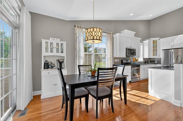 Dining room, Interior, Kitchen, Pendant Lights, Recessed Lighting, Stainless Steel Appliances, Wood Texture Flooring