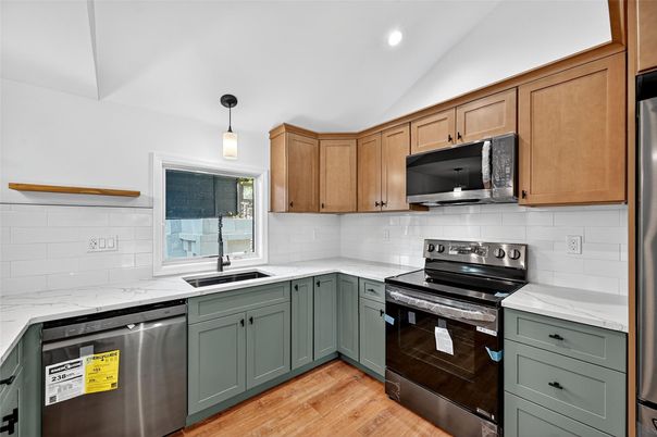 Interior, Kitchen, Pendant Lights, Recessed Lighting, Stainless Steel Appliances, Wood Texture Flooring