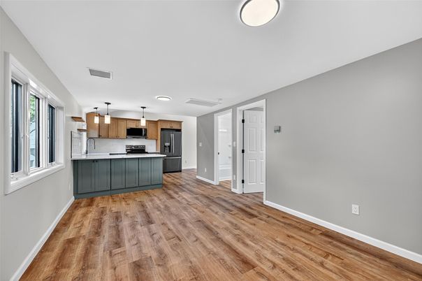 Interior, Kitchen, Pendant Lights, Recessed Lighting, Stainless Steel Appliances, Wood Texture Flooring