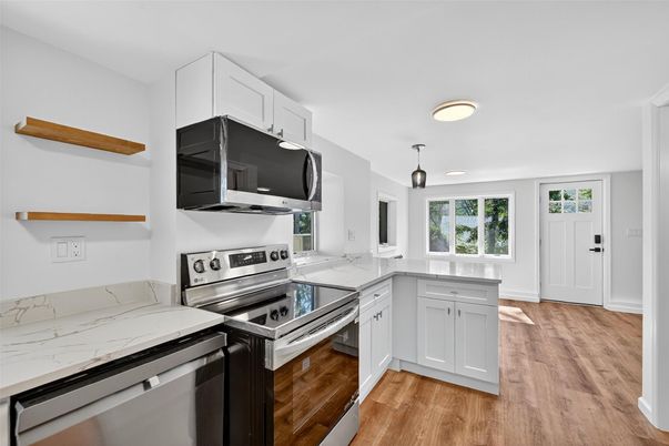 Interior, Kitchen, Recessed Lighting, Stainless Steel Appliances, Wood Texture Flooring