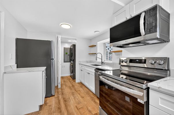 Interior, Kitchen, Recessed Lighting, Stainless Steel Appliances, Wood Texture Flooring