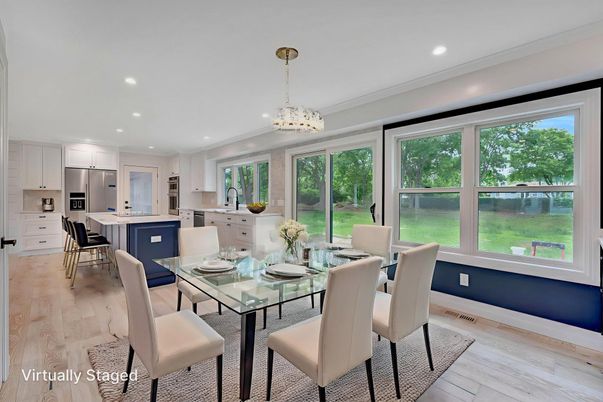 Chandelier, Dining room, Interior, Kitchen, Recessed Lighting, Stainless Steel Appliances, Wood Texture Flooring