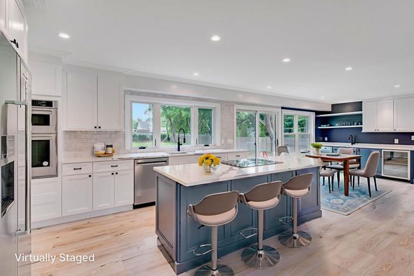 Dining room, Interior, Kitchen, Recessed Lighting, Stainless Steel Appliances, Wood Texture Flooring