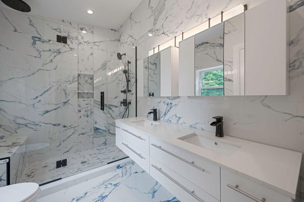 Bathroom, Dual Sink Vanities, Glass Shower, Interior, Marble, Marble Walls, Recessed Lighting