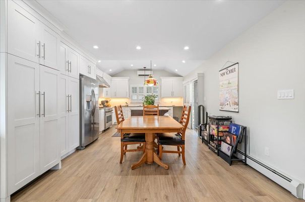 Dining room, Interior, Kitchen, Pendant Lights, Recessed Lighting, Stainless Steel Appliances, Wood Texture Flooring
