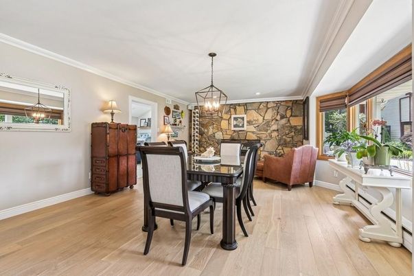 Dining room, Fireplace, Interior, Pendant Lights, Recessed Lighting, Stone Walls, Wood Texture Flooring