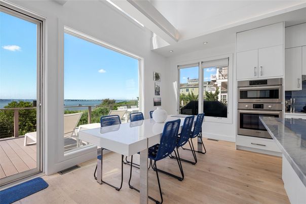 Dining room, Interior, Kitchen, Recessed Lighting, Stainless Steel Appliances, Water, Wood Texture Flooring