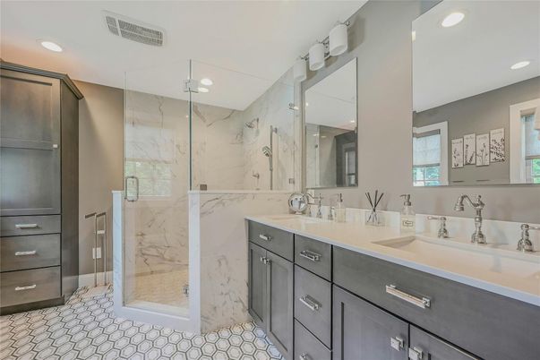 Bathroom, Dual Sink Vanities, Glass Shower, Interior, Marble Walls, Recessed Lighting