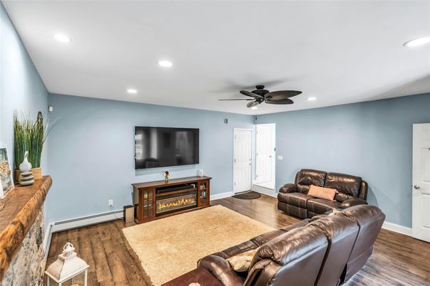 Fireplace, Interior, Living room, Recessed Lighting, Wood Texture Flooring