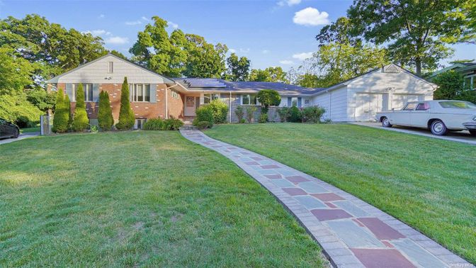 Attached, Backyard, Exterior, Facade, Brick Facade, Solar Panels, Ranch