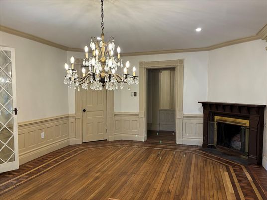 Chandelier, Empty room, Fireplace, Interior, Recessed Lighting, Wood Texture Flooring