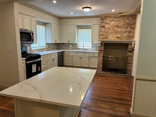 Fireplace, Interior, Kitchen, Recessed Lighting, Stone Walls, Wood Texture Flooring