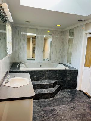 Bathroom, Dual Sink Vanities, Interior, Marble Walls, Recessed Lighting