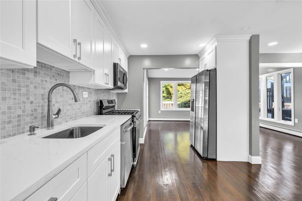 Interior, Kitchen, Recessed Lighting, Stainless Steel Appliances, Wood Texture Flooring