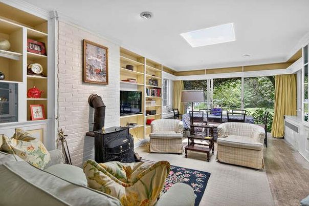 Fireplace, Interior, Living room, Recessed Lighting, Stone Walls, Wood Texture Flooring