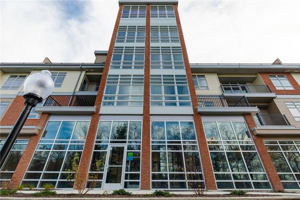 Exterior, Facade, Brick Facade, Condo Building