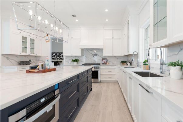 Interior, Kitchen, Marble Walls, Pendant Lights, Recessed Lighting, Stainless Steel Appliances, Wood Texture Flooring