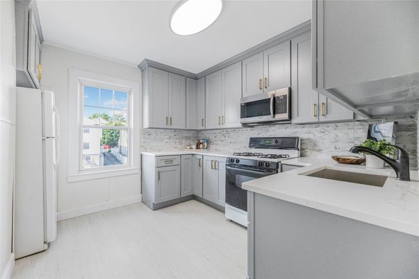 Interior, Kitchen, Marble Walls, Stainless Steel Appliances, Wood Texture Flooring