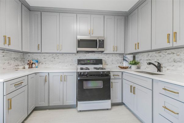 Interior, Kitchen, Marble Walls, Stainless Steel Appliances, Wood Texture Flooring