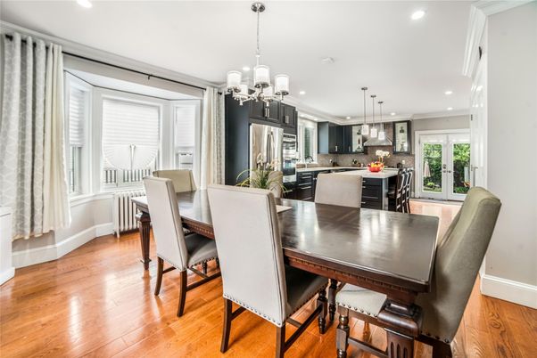 Chandelier, Dining room, Interior, Kitchen, Pendant Lights, Recessed Lighting, Stainless Steel Appliances, Wood Texture Flooring