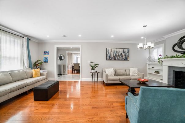 Chandelier, Fireplace, Interior, Living room, Recessed Lighting, Wood Texture Flooring