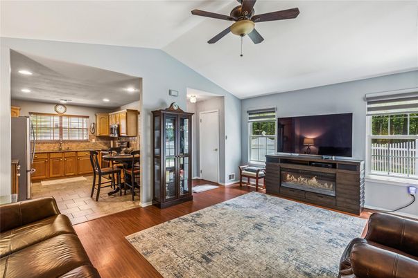Dining room, Fireplace, Interior, Kitchen, Living room, Recessed Lighting, Wood Texture Flooring