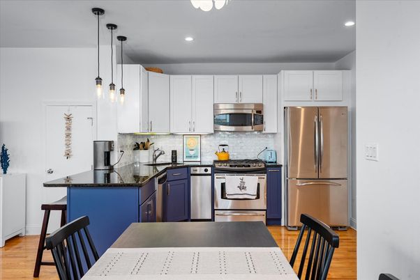 Interior, Kitchen, Pendant Lights, Recessed Lighting, Stainless Steel Appliances, Wood Texture Flooring