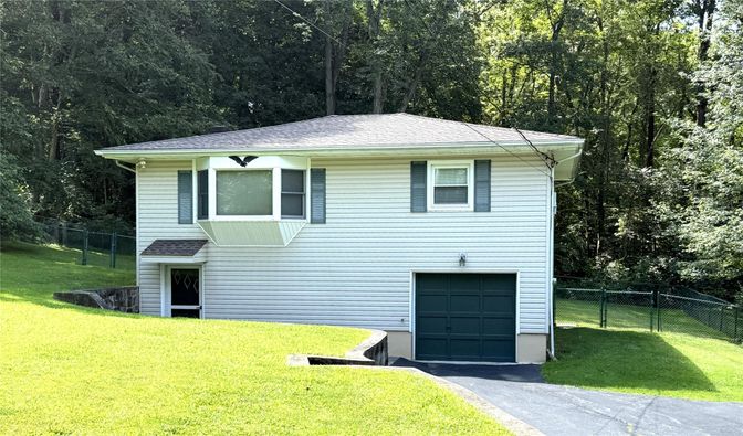 Attached, Exterior, Facade, Raised Ranch
