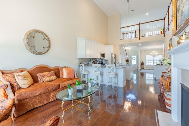 Chandelier, Fireplace, Interior, Kitchen, Living room, Pendant Lights, Recessed Lighting, Wood Texture Flooring