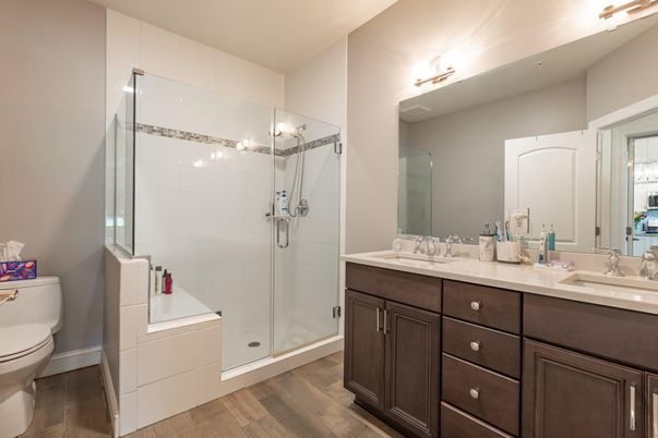 Bathroom, Dual Sink Vanities, Glass Shower, Interior, Wood Texture Flooring