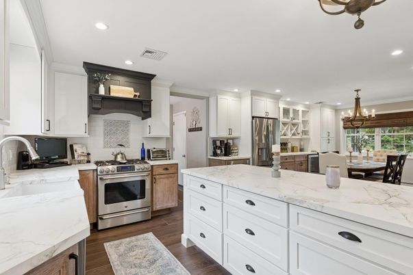 Chandelier, Dining room, Interior, Kitchen, Pendant Lights, Recessed Lighting, Stainless Steel Appliances, Wood Texture Flooring