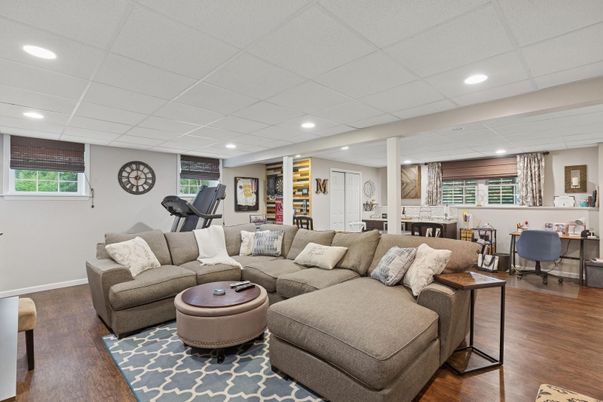 Dining room, Fireplace, Fitness Equipment, Interior, Living room, Recessed Lighting, Wood Texture Flooring