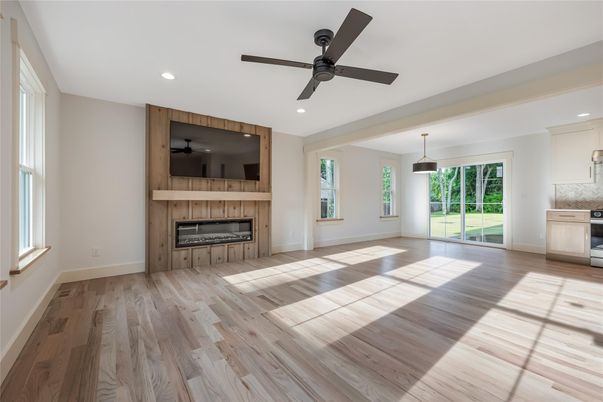 Empty room, Fireplace, Interior, Pendant Lights, Recessed Lighting, Wood Texture Flooring