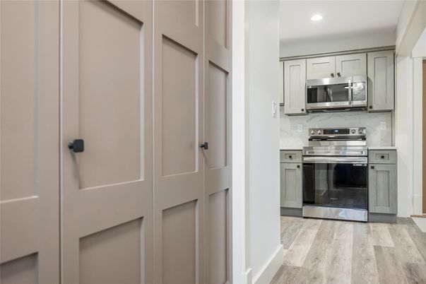 Interior, Kitchen, Recessed Lighting, Stainless Steel Appliances, Wood Texture Flooring