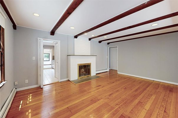 Empty room, Fireplace, Interior, Recessed Lighting, Wooden Beams, Wood Texture Flooring