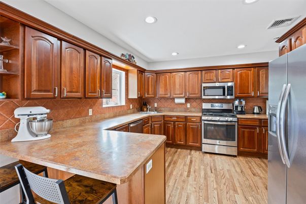 Interior, Kitchen, Recessed Lighting, Stainless Steel Appliances, Wood Texture Flooring