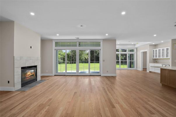 Empty room, Fireplace, Interior, Recessed Lighting, Wood Texture Flooring