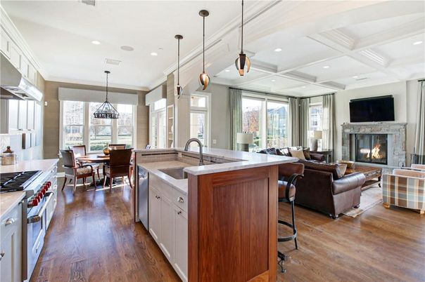 Dining room, Fireplace, Interior, Kitchen, Living room, Pendant Lights, Recessed Lighting, Stainless Steel Appliances, Wood Texture Flooring