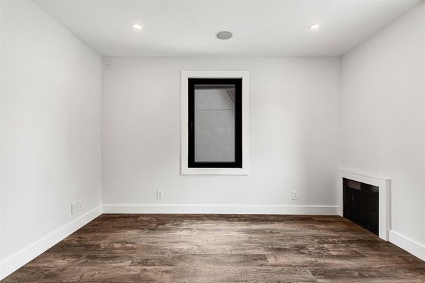Empty room, Fireplace, Interior, Recessed Lighting, Wood Texture Flooring
