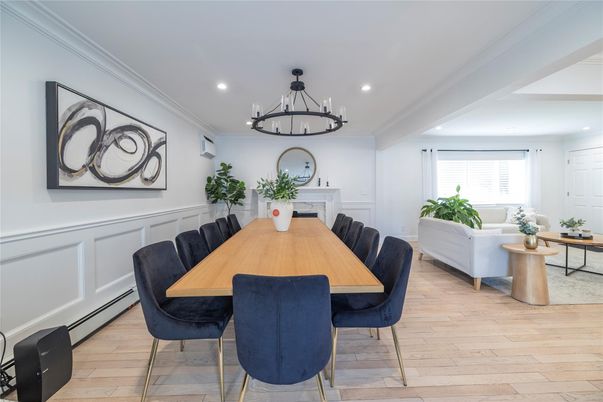 Chandelier, Dining room, Fireplace, Interior, Living room, Recessed Lighting, Wood Texture Flooring