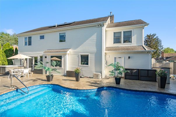 Exterior, Pool, Solar Panels