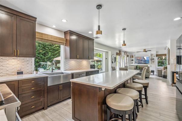 Dining room, Interior, Kitchen, Pendant Lights, Recessed Lighting, Stainless Steel Appliances, Wood Texture Flooring