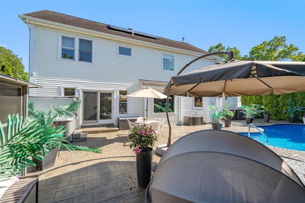 Exterior, Pool, Solar Panels