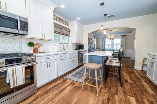 Interior, Kitchen, Pendant Lights, Recessed Lighting, Stainless Steel Appliances, Wood Texture Flooring