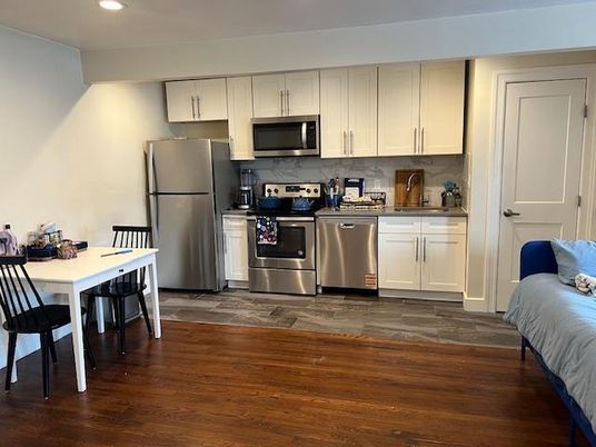 Dining room, Interior, Kitchen, Recessed Lighting, Stainless Steel Appliances, Wood Texture Flooring